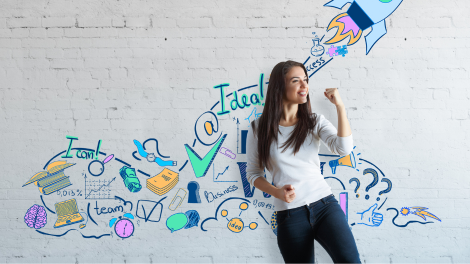 A student entrepreneur with a whiteboard of ideas