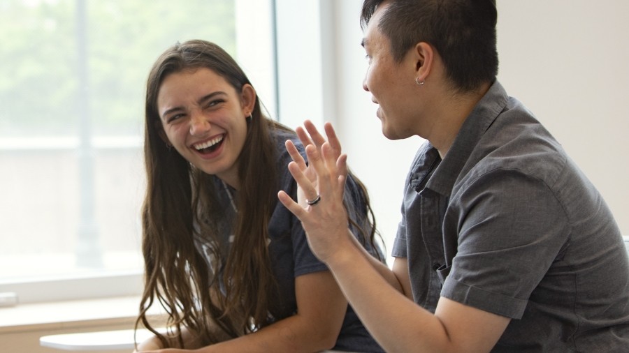 Students interacting in Mulroney Hall