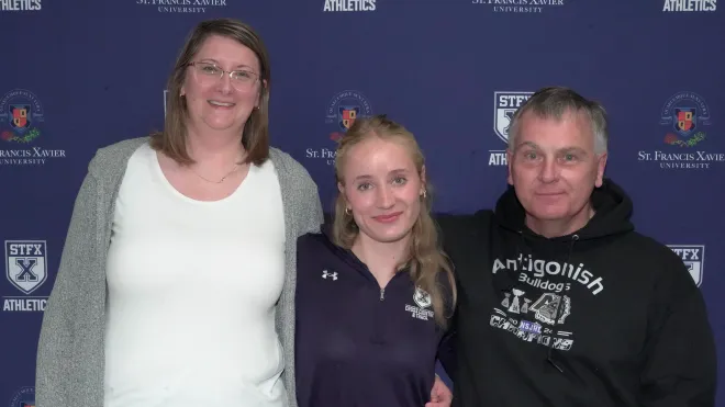 StFX chemistry student Poppy Moon with Dr. Geniece Hallett-Tapley and Dr. Gerry Marangoni