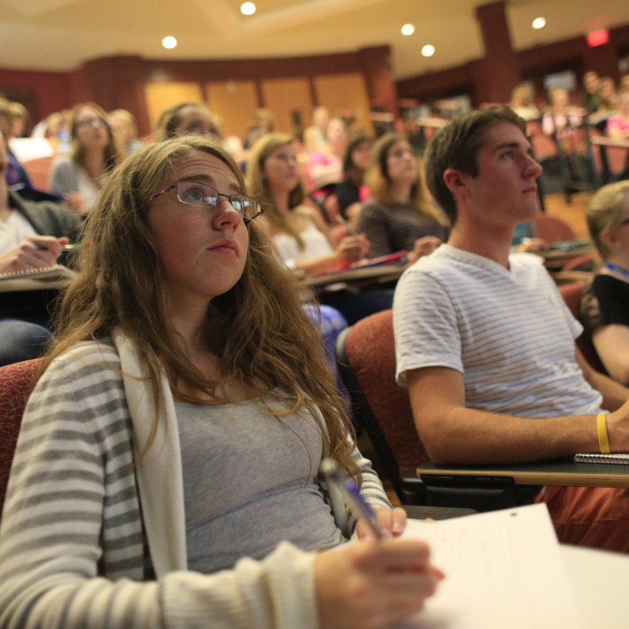 Students listening a lecture in a classroom. 