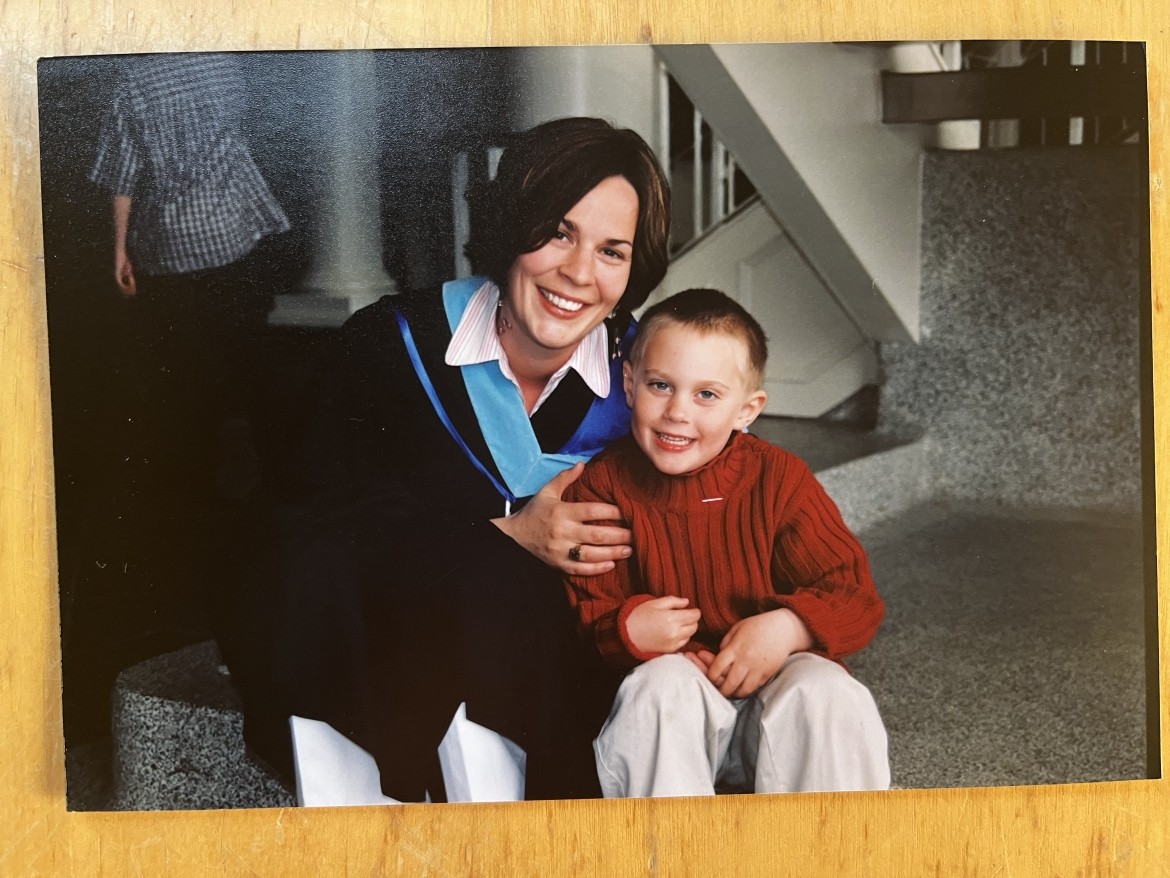 A graduating mother and her son