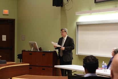 Professor Presenting his Findings